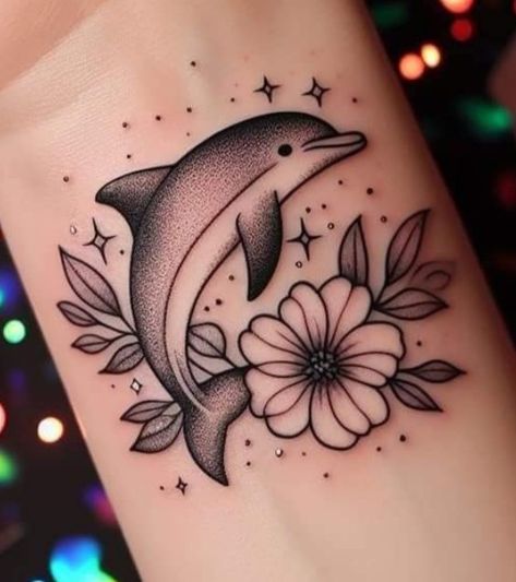 Dolphin And Flower Tattoo, Tattoo Dolphin, Dolphin Tattoo, Maching Tattoos, Tattoo Over Scar, Dolphins Tattoo, Free Tattoo Designs, Shiva Tattoo Design, Star Tattoo Designs