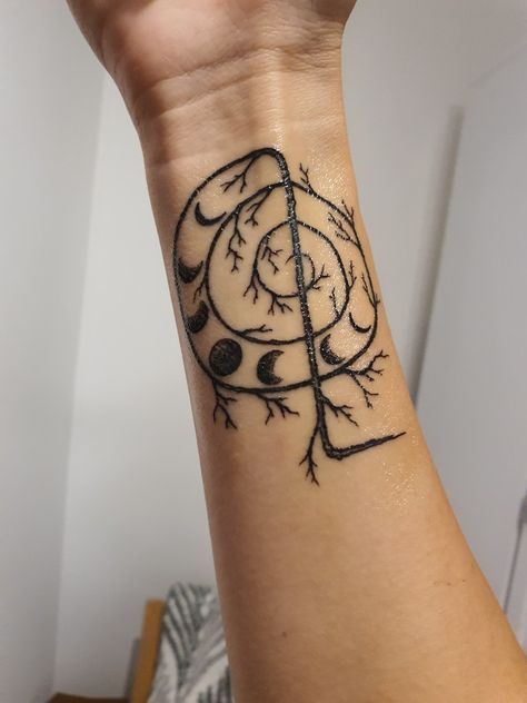 Combined symbol of reiki - Cho ku rei,  styled like a tree branch, with the moon phases alongside the spiral. Reiki Tattoo, Reiki Symbols Tattoos, Fertility Tattoo, Healer Tattoo, Earthy Tattoos, Chakra Tattoo, Moon Phases Tattoo, Mystical Tattoos, Witch Tattoo