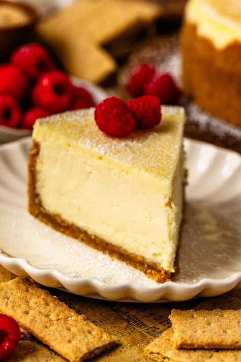 New York Cheesecake creamy and rich with a buttery graham cracker crust. Graham Cracker Crust Cheesecake, Pies And Tacos, Creme Brulee Cheesecake, Cinnamon Roll Cheesecake, Favorite Pie Recipes, Chocolate Macaron, Vegan Cupcakes, New York Cheesecake, Favorite Pie