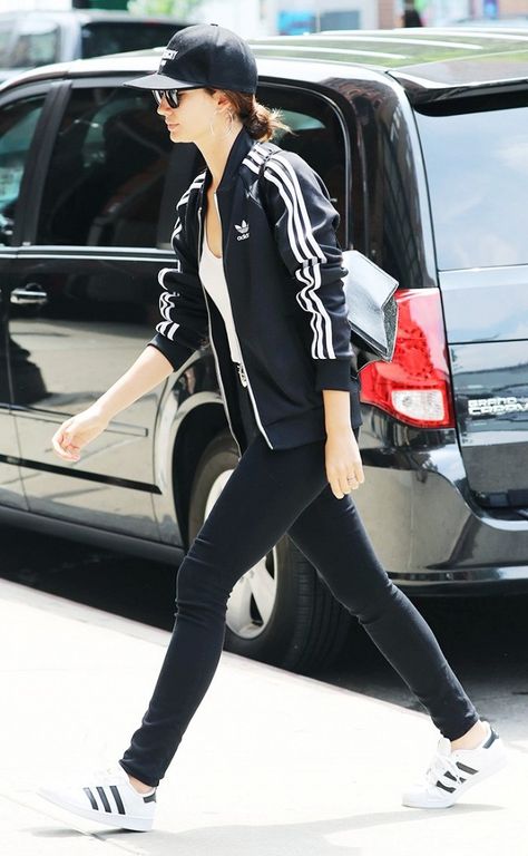 Lily Aldridge steps out in a head to toe Adidas inspired look.  The model paired a tracksuit jacket with black jeans and superstar sneakers Adidas Jacket Women Outfit, Summer Athletic Outfits, Adidas Jacket Outfit, White Adidas Jacket, Looks Adidas, Adidas Jacket Women, Adidas Outfit Women, Jacket Outfit Women, Look Adidas