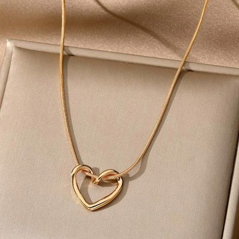 Elevate your everyday style with our stunning heart necklaces! 💖 Crafted from durable stainless steel in a timeless gold finish, these necklaces are the perfect accessory to add a touch of love and elegance to any outfit. Get Now for free shipping and low price 💥👇 https://glowonlinestore.com/products/simple-love-heart-necklace-for-women . . #heartnecklaces #stainlessteeljewelry #goldjewelry #womensnecklaces #fashionjewelry #statementnecklaces #minimalistnecklaces #delicatejewelry #trendyneckl... Jewellery Photo, Pendant Necklace Simple, Hollow Heart, Mens Jewelry Necklace, Waterproof Jewelry, Cute Charms, Mua Sắm, Heart Pendant Necklace, Jewelry Party