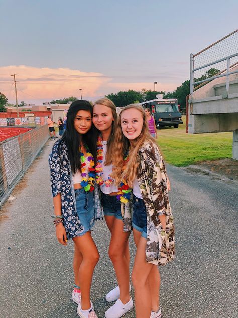 Tropical Out Football Game Tropical Football Game Outfit, Tropical Homecoming Theme Outfits, Hawian Football Theme Outfit, Tropical Theme Outfit School, Tropical Dress Up Day School, Tropical Football Theme Outfit, Tropical Theme Football Game, Hawaii Theme Football Game Outfit, Tropical Outfit Ideas Spirit Week