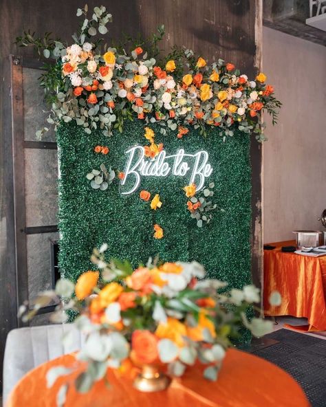 Bridal Shower Grass Backdrop, Fall Floral Bridal Shower Theme, Bridal Shower Margaritas, Summer Bridal Shower Backdrop, Grass Wall Backdrop Bridal Shower Ideas, Bridal Shower Burnt Orange, Orange Theme Decor, Aperol Spritz Bridal Shower Theme Backdrop, Bridal Shower Flower Backdrop