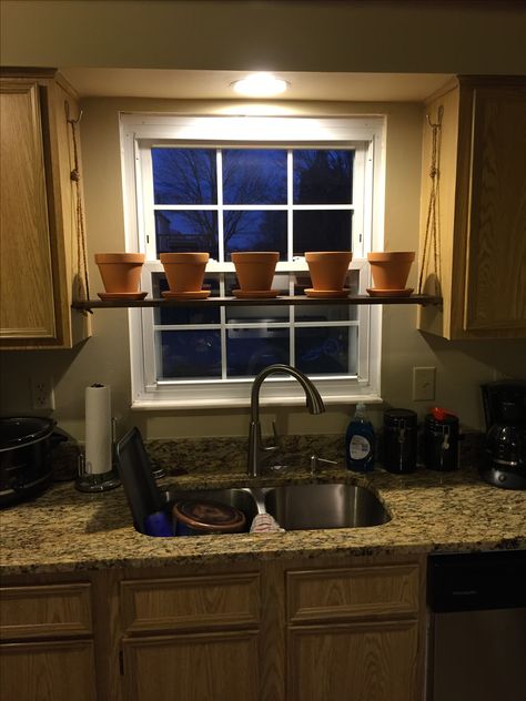 Plant shelf above sink Behind The Sink Shelf, Kitchen Sink Plant Shelf, Shelf Between Cabinets Over Sink, Over Sink Plant Shelf, Kitchen Window Shelf Over Sink Ideas, Over The Sink Plant Shelf, Diy Over The Sink Shelf, Diy Over Sink Shelf, Space Above Kitchen Sink