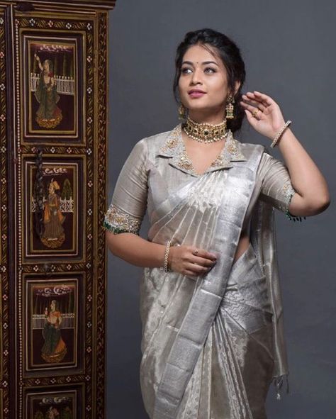 Silver and Grey Sarees- For The Bold And The Beautiful! Silver Suit, Suit Neck, Blouse Designs High Neck, Blouse Designs Catalogue, Pattu Saree Blouse Designs, Saree Blouse Neck Designs, Jacket Blouse, Designer Saree Blouse, New Blouse Designs