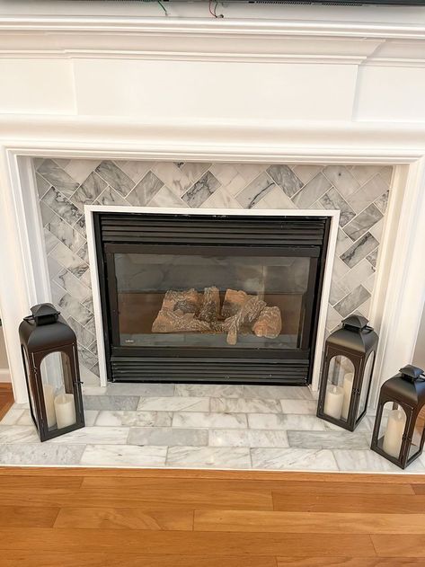 How we tiled in our fireplace- chevron fireplace, herringbone tile fireplace, fireplace update Tile For Around Fireplace, Fireplace Herringbone Tile, Diy Tile Fireplace, Fireplace Tile Makeover, Tiling A Fireplace, Herringbone Fireplace Surround, Fireplace Herringbone, Chevron Fireplace, Fireplace Surround Diy