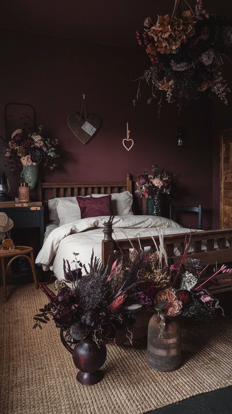 Discover how to transform your bedroom with dark cottagecore decor. Explore textures, colors, and furniture that embody this enchanting, moody aesthetic. Witchy Maximalist Bedroom, Dark Wall Room Ideas, Dark Garden Bedroom Aesthetic, Berry Bedroom, Moody Maroon Bedroom, Dark Plum Wall Color, Dark Earth Tones Aesthetic, Dark Green And Burgundy Bedroom, Dark Colored Bedroom Ideas