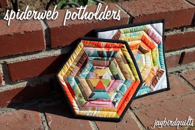 This free quilt pattern is for the spiderweb potholders.  Awesome! Hexagon Potholder, Jaybird Quilts, International Quilt Festival, Quilted Potholders, Potholder Patterns, Bird Quilt, Quilt Festival, Sewing Tutorials Free, Free Quilting