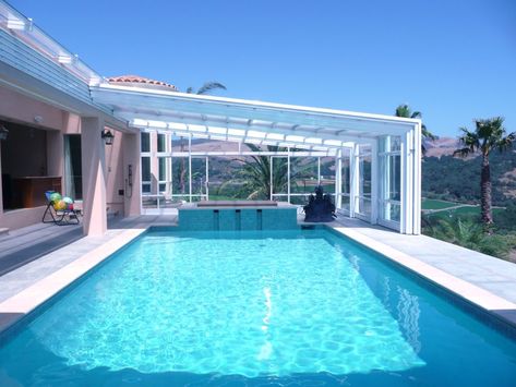 California Pool Enclosure Manufactured by Roll-A-CoverAmerica's Leading Custom Manufacturer of Retractable Enclosure and Roof Systems Glass Patio Enclosure, Pool Pergolas, Retractable Pool Cover, Covered Pool, Retractable Enclosure, California Pools, Swimming Pool Enclosures, Pool Pergola, Outdoor Ambiance