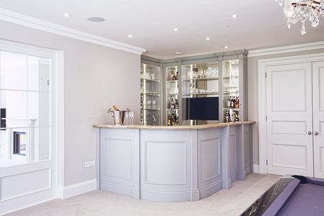 Interior Design- A Coastal Hideaway in Sandbanks by  Hayburn & Co. | This Is Glamorous (4) Wet Bar Designs, Home Wet Bar, Media Room Design, Natural Stone Countertops, Shelving Storage, Curved Bar, Bar Designs, Wet Bars, Living Room Bar