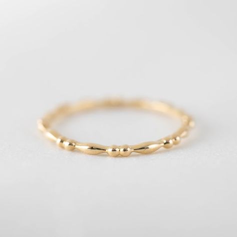 This is a full eternity style solid gold bead ring. Band width x height: approx. 1.5x1.2mm Made of 100% recycled solid 14k gold Our Dedication All our jewelry is designed and created by Kat with great attention to details and the entire production from casting, stone setting to finishing takes Paper Ring, Dainty Gold Rings, Zierlicher Ring, Beaded Ring, Gold Ring Designs, Daily Jewelry, Jewels Rings, Rose Gold White, White Gold Band