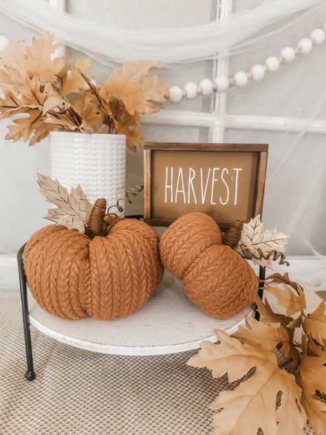 These sweater pumpkins are great additions to any Fall or Thanksgiving decor.  Sold as a set of two, you will receive two sizes.  The larger pumpkin measures approximately 6 inches wide and approximately 3.5 inches tall, not including the stem or leaf (total height with leaf is approximately 6 inches from the top of the leaf to the bottom).  The smaller pumpkin measures approximately 4.5 inches wide and approximately 2.75 inches tall (total height including the leaf is approximately 4.25 inches Fall Home Decor Retail Display, Fall Home Vibes, Hobby Lobby Fall Decor 2024, Fall Home Decor Farmhouse, Autumn Shelf Decor, Living Room Fall Decorations, Fall Couch Decor, Classy Fall Decor, Green Fall Decor