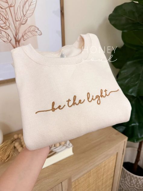 (1) Embroidered Be the Light Sweatshirt - Faire Christian Embroidery, Faith Sweatshirt, Christian Clothes, Embroidery Crewneck, Christian Crewneck, Embroidery Business, Jesus Clothes, Christian Shirts Designs, Christian Merch