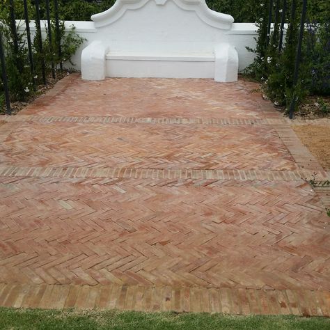 Lanes Ceramic Works klompie bricks laid in herringbone pattern in the gardens at Vrede en Lust Terracotta Driveway, Brick Terrace, Klompie Bricks, Brick Courtyard, Brick Driveway, Pool Paving, Brick Edging, Brick Laying, Antique Brick