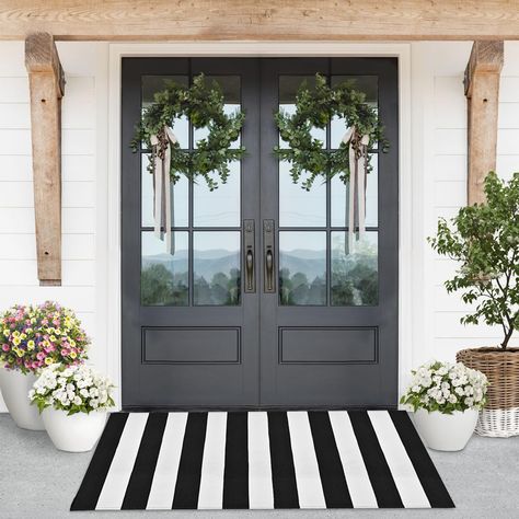 PRICES MAY VARY. Design Your Farmhouse Entryway: Elevate your front porch by adding our versatile 3' x 5' black and white striped rug for a layered front door look. Its ideal dimensions enable perfect pairing with any 18 x 30 doormat, allowing you to create your dream entrance IDEAL GIFT CHOICE: The Lili Rey black white stripes rug, beautifully packaged, is a unique gift for any occasion. Ideal for housewarmings, Mother's Day, or as a seasonal touch for Halloween and Christmas. Enhance any doorw Black And White Striped Rug, Plaid Door Mat, Striped Outdoor Rug, Striped Door, Front Porch Rug, Porch Mat, Ranch House Exterior, Black Front Doors, Porch Rug