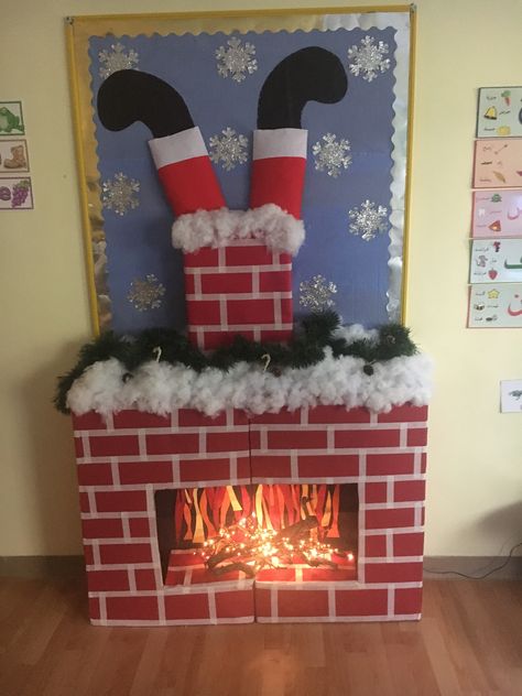 Fireplace Board Preschool, Classroom Fireplace Bulletin Boards, Fireplace Classroom Decoration, Fireplace Christmas Door Decorations, Christmas Fireplace Bulletin Board, Chimney Bulletin Board Ideas, Fireplace Preschool Classroom, Diy Fireplace For Classroom, Fireplace Classroom Door Decoration