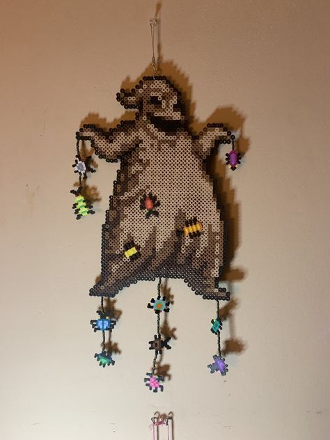 Melted Beads Designs, Pentagram Perler Beads, Oogie Boogie Perler Bead Pattern, Perler Bead Ghostface, Perler Designs Ideas, Art The Clown Perler Beads, Skeleton Perler Bead Patterns, Plague Doctor Perler Beads, Oogie Boogie Perler Beads