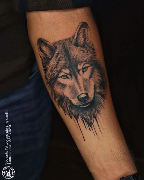 Best Wolf Tattoos For Men, Wolf Tattoo Realism, Small Wolf Tattoo Men, Wolf Tattoo Design Men Arm, Wolf Mom Tattoo, Men Wolf Tattoo, Realistic Wolf Tattoo Design, Wolf Head Tattoo Design, Wolf Arm Tattoo