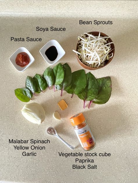 Ingredients - Bean Sprouts, Malabar Spinach, Yellow Onion, Garlic, Pasta Sauce, Soya Sauce, Vegetable Stock Cube, Paprika, Black Salt, Olive Oil. Method - 1. Dissolve vegetable stock cube in a glass of boiled water - chop veggies - keep aside 2. add olive oil in a pre-heated sauce pan - fry chopped onion, minced garlic, chopped spinach, bean sprouts (snap tail) - stir - cook 3. add paprika - veg stock - adjust water & salt - bring to boil 4. add pasta & soya sauce - bring to boil. Done! Bean Sprout Soup, Malabar Spinach, Vegetable Stock Cubes, Soya Sauce, Bean Sprouts, Chopped Spinach, Vegetable Stock, Yellow Onion, Chopped Onions