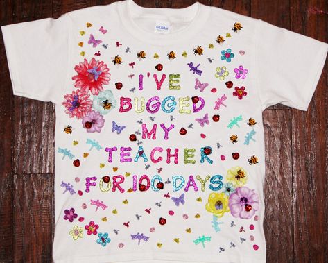 Girls 100 days of school shirt. Ava's 100th day of school bug shirt. Made with glitter foam letters and  small plastic bugs and paper flowers. "I've bugged my teacher for 100 days" Barbie 100 Days Of School, 100th Day Of School Shirts For Girls Diy, Bugging My Teacher For 100 Days, 100 Days Pom Pom Shirt, 100 Days Of School Shirt Gumball Machine, 100days Of School Shirt, Mermaid School, My Teacher Survived 100 Days Of Me Shirt, 100th Day Of School Crafts