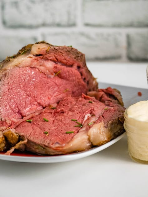 Sous vide prime rib is perfectly cooked beef! Cook your standing rib roast with a sous vide for tender and delicious beef cooked exactly how you want it. The perfect centerpiece for a holiday celebration! Standing Prime Rib Roast Recipe, Bone In Ribeye Roast, Sous Vide Roast Beef, Sous Vide Recipes Beef, Sous Vide Prime Rib, Sous Vide Ribeye, Prime Rib Soup, Boneless Prime Rib Roast, Leftover Prime Rib