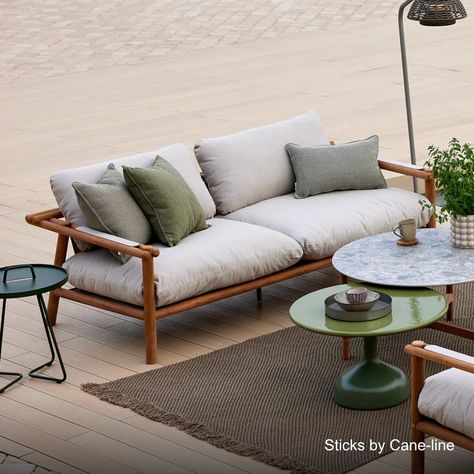 Sticks by Cane-line is a new collection combining stunning solid teak or sleek powder coated aluminium with super soft seat cushions for a relaxed rustic style.⁠ ⁠ Take a closer look using our linkin.bio ⁠ ⁠ Image description:⁠ 1/3 A teak framed outdoor sofa with plump off-white cushions rests on plank decking.⁠ 2/3 A woman sits in a teak framed outdoor armchair with plump brown cushions.⁠ 3/3 A solid teak bench next to a teak framed outdoor table.⁠ ⁠ ⁠ #wormturned #revitalisingoutdoorspace #... Relaxed Rustic, Teak Bench, Brown Cushions, Outdoor Armchair, Image Description, Teak Frame, White Cushions, Outdoor Living Areas, Rustic Design