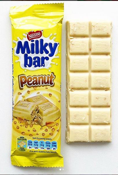 Nestlé Milky Bar Peanut from South Africa 🇿🇦. This bar is a lot smaller compared to the other Milky bars I’ve seen. The ratio of chopped peanuts is very high and it blends incredibly well with the sweet white chocolate. Milky Bar, Milky Bar Chocolate, Snack Cart, Chocolate Labels, White Chocolate Bar, Milk Bar, Happy New Year Greetings, New Year Greetings, Pops Cereal Box