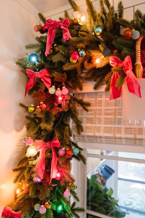 Kitchen Christmas Garland with Ribbon - Blushing Bungalow | So Cute You'll Blush ☺️ Ribbon Tinsel Christmas Tree, Vintage Bow Christmas Tree, Christmas Decor Bright Colors, Pink Retro Christmas Aesthetic, Over The Top Christmas Tree, Christmas Tinsel Garland Ideas, Christmas 90s Aesthetic, Tinsel Garland Ideas, Christmas Garland With Ribbon