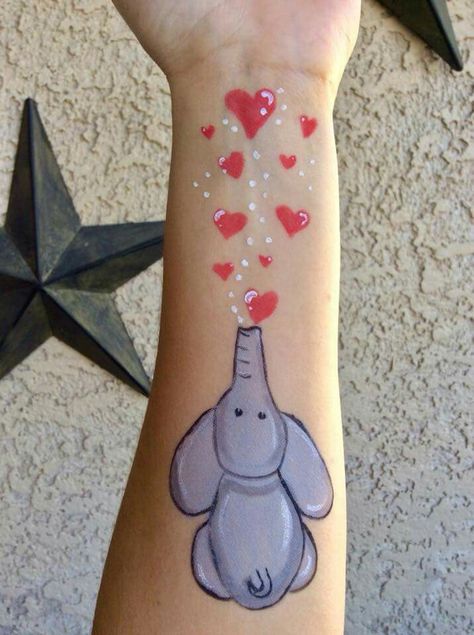 Valentines Day Face Paint For Kids, Valentine Face Painting For Kids, Elephant Face Painting, Valentines Day Face Paint, Hearts Face Paint, Pink Heart Face Tattoo, Elephant Face Paint, Valentines Face Painting Ideas, Face Painting Heart