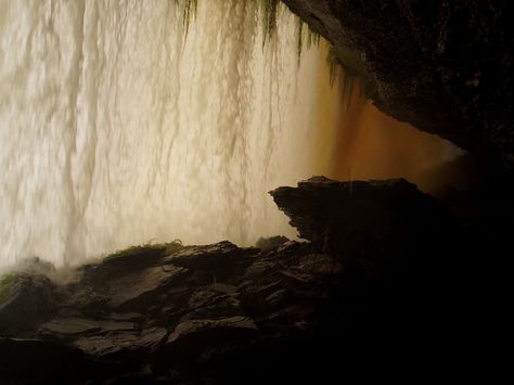 go behind a waterfall Behind Waterfall Caves, Hidden Cave Behind Waterfall, Cave Behind Waterfall, Behind Waterfall, Behind A Waterfall, Aesthetic Scenery, Cliff Face, Background Reference, Cave Entrance