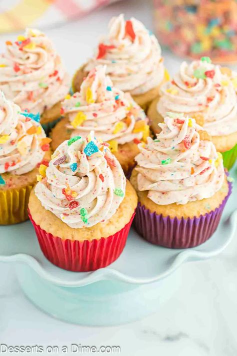 These colorful Fruity Pebbles Cupcakes make a great treat for birthday parties. The frosting is flavored with crushed fruity pebbles cereal. Fruity Pebbles cereal is added into the cake mix and the decadent frosting. The combination is a burst of flavor and gorgeous colors. #dessertsonadime #fruitypebblescupcakes #fruitypebbles #cupcakes Fruity Peoples Cupcakes, Fruity Pebbles Cupcakes, Fruity Pepples, Cereal Cupcakes, Fruity Pebble Cupcakes, Fruity Pebbles Treats, Fruity Cupcakes, Delicious Cupcakes Recipes, Fruity Pebbles Cereal