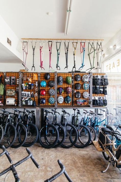 Garage Bike Shop, Bike Shop Aesthetic, Bike Shop Interior Design, Bike Shop Ideas, Bicycle Shop Design, Bicycle Shop Interior, Cycle Store Design, Communal Bike Storage, Bike Cafe Design Coffee Shop Bicycles