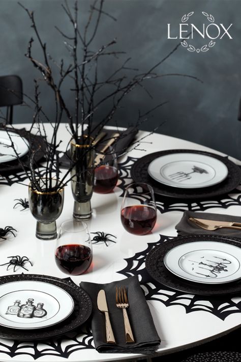 Pair the Lenox Chelse Muse Fleur Matte Black 4-piece Dinner Plate Set crafted of durable and intriguing black ironstone with wickedly enchanting Vintage Halloween 4-piece dessert plate set crafted of ivory porcelain and features hand-drawn artwork of a chandelier, a raven, potions and a candelabra. This table setting will bring a bit of haunted mystery to your home and add well with formal and casual dinnerware. #Halloween #cocktails #spookyseason #October #Halloweendecor Table Setting Halloween, Black Halloween Table Decor, Halloween Dinner Table Setting, Halloween Wedding Table Settings, Halloween Place Settings, Halloween Table Set Up, Gothic Table Setting, Halloween Table Decorations Party, Halloween Dinner Table Decor