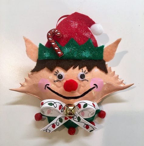 This cute elf was made from a MD blue crab shell, painted and embellished to be one of Santa's helpers. So cute on the Christmas tree! Painted Crab Shells, Crab Shell Ornaments, Crab Ideas, Creek Ideas, Cajun Christmas, Crab Party, Crab Pot, Crab Ornament, Crab Crafts