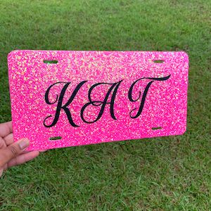 License Plate Ideas, Custom Front License Plates, Barbie Font, Glitter Car, Bmw Girl, Girl Car, Custom Bling, Custom Plates, Car Tag