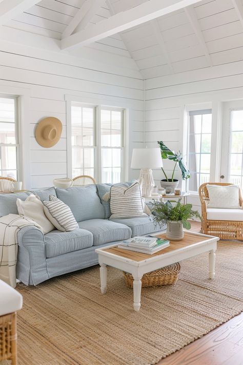 Create a breezy, beach-inspired space with coastal living room ideas. Click to see more. Beach House Chic Interior Design, Light Blue Themed Living Room, Small Cozy Tv Room, Coastal Chic Apartment, Coastal Beach House Interiors Living Room, Vintage Coastal Living Room, Coastal Cozy Living Room, Coastal Farmhouse Living Room Ideas, Coastal Couch