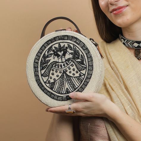 Peacock hand embroidery madhubani sling bag Experience the perfect blend of tradition and modernity with our handcrafted peacock embroidery sling bag. Expertly created by tribal artisans, this spacious bag features stunning embroidery on sustainable jute fabric, enhanced with elegant brass attachments. A true testament to artisanal craftsmanship and sustainable fashion. . #HandcraftedFashion #TribalArtistry #SustainableStyle #JuteBag #ArtisanCrafted #EthicalFashion #BohoChic #EcoFriendlyAcce... Peacock Hand Embroidery, Peacock Embroidery, Jute Fabric, Jute Bags, Ethical Fashion, Sling Bag, Sustainable Fashion, Hand Embroidery, Boho Chic