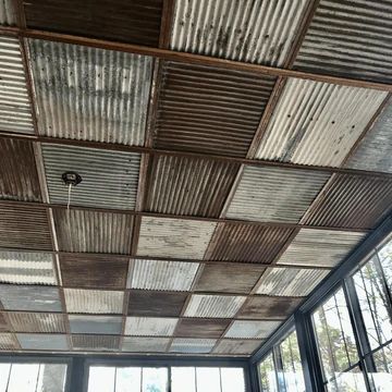 Rustic Kitchen Tiles Wall, Tin Bathroom Ceiling, Rustic House Woodworking Plans, Metal Interior Ceiling, Rustic Tin Walls, Barn Loft Apartment Rustic, Corrugated Metal Ceiling Porch, Rustic Ceiling Tiles, Rusted Tin Ceiling