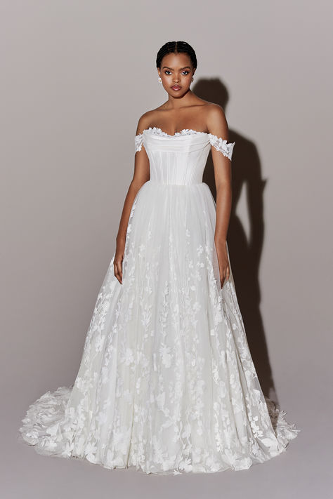 This timeless off-the-shoulder ball gown features a corset bodice with peek a boo embroidered lace along the sweetheart neckline. The skirt is adored with sequined lace appliqués and flows to a chapel length train. Wedding Dress With Corset, Justin Alexander Bridal, Justin Alexander Wedding Dress, Justin Alexander Signature, Wedding Dress Boutiques, Bridal Elegance, Justin Alexander, Charlotte Wedding, Designer Bridal Gowns