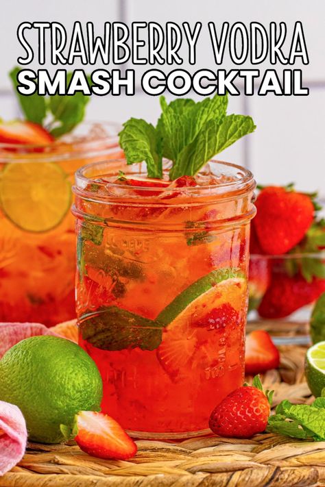 Say cheers to summer heat and pool parties with a refreshing Strawberry Vodka Smash Cocktail, full of sweet berries, cool mint, and lime! #BreadBoozeBacon #strawberry #vodka #smashcocktail #smash #cocktail #mint #lime #simplesyrup #drinks #happyhour #girlsnight #poolparty #tailgating Mint Vodka Cocktails, Strawberry Lime Vodka Smash, Strawberry Vodka Drinks, Strawberry Mint Cocktail, Cucumber Spritzer Vodka, Strawberry Gin Smash Cocktail, Cucumber Mint Vodka Cocktail, Alcoholic Drinks Vodka, Strawberry Basil Gin Cocktail