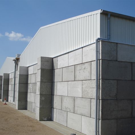 Industrial buildings - interlocking concrete blocks with steel roof constructions - Legioblock EN Concrete Warehouse, Air Crete, Industrial Building Design, Interlocking Concrete Blocks, Concrete Block House, Glass Roofing, Roofing Colors, Industrial Roofing, Building A Storage Shed