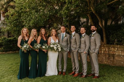 Greenery Wedding Outfit, Suits For Green Wedding, Hunter Green Wedding Groomsmen, Wedding Party Attire Green, Emerald Green And Tan Wedding Party, Dark Green Tuxedo Wedding Groom Style, Hunter Green Wedding Bridal Party, Flowers That Go With Emerald Green, Forest Green Bridesmaid Dresses With Groomsmen