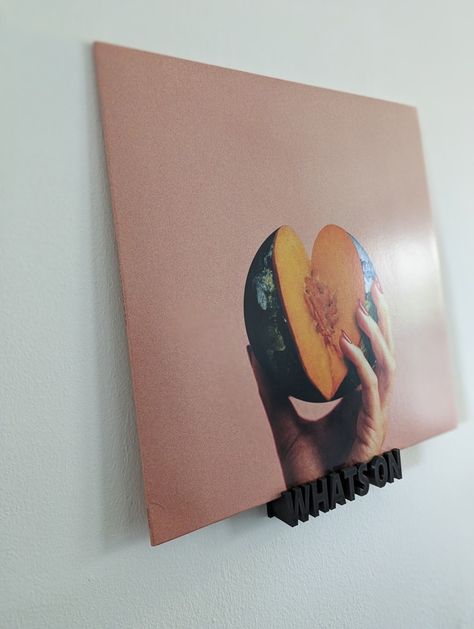 A 3D printed wall mounted record hanger Record Holder Wall, Vinyl Holder, Vinyl Record Holder, Record Holder, Marketing And Advertising, Remote Work, Etsy App, Selling On Etsy, Sell On Etsy