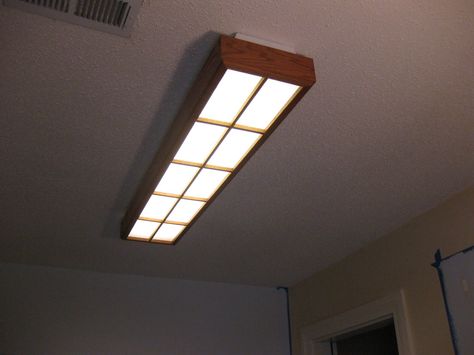 This would greatly improve the hideous thing I have hovering above my kitchen. Light Covers Diy, Fluorescent Light Covers Diy, Fluorescent Kitchen Lights, Flourescent Light, Fluorescent Light Covers, Light Fixture Covers, Chandelier Makeover, Fluorescent Light Fixture, Ceiling Light Covers