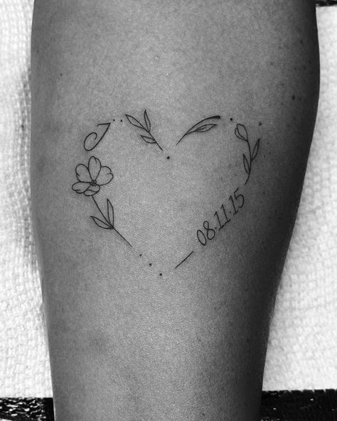 Cute dainty heart down for her kids, each of them start with a J and the dates are each the year they were born. So simple and such a nice way to represent the kids. #finelinetattoo #daintytattoo #fineline #dainty #flowerheart Simple Grandparents Tattoo, Heart Birth Flower Tattoo, Heart And Date Tattoos, A And J Tattoo, Heart With Date Tattoo, Tattoos For Miscarriages Simple, J Heart Tattoo, Tattoos For Kids Unique, Grandparents Tattoo