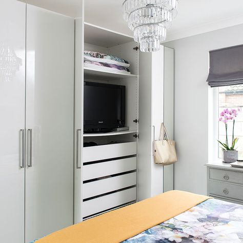 Hi-gloss-built-in-wardrobes-with-TV-storage-ways-to-disguise-your-TV Wardrobe With Tv Unit, Fitted Wardrobes Bedroom, Wardrobe Tv, Bedroom Built Ins, Bedroom Built In Wardrobe, Bedroom Tv, Wardrobe Door Designs, Bedroom Closet Design, Fitted Wardrobes