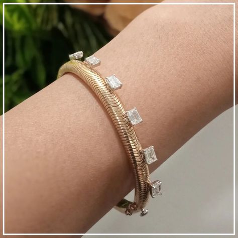 𝑫𝒊𝒂𝒎𝒐𝒏𝒅 𝒂���𝒏𝒅 𝑮𝒐𝒍𝒅 𝑪𝒖𝒇𝒇 𝑩𝒓𝒂𝒄𝒆𝒍𝒆𝒕 Classic design meets modern luxury. This beautiful cuff bracelet is made with 18Kt Yellow Gold and adorns Emerald-cut Natural Diamonds for a truly refined look. DM or WhatsApp us to Shop Now! +91 98725 30673 Price ₹3,55,000/- #diamondbracelet #goldbracelet #cuffbracelet #naturaldiamonds #luxuryjewelry #highjewelry #diamondjewelry #MadanJewellersIndia Diamond Cuff Bracelet, Gold Cuff Bracelet, Gold Bracelet Cuff, Gold Cuffs, August 12, Diamonds And Gold, High Jewelry, Emerald Cut, Modern Luxury