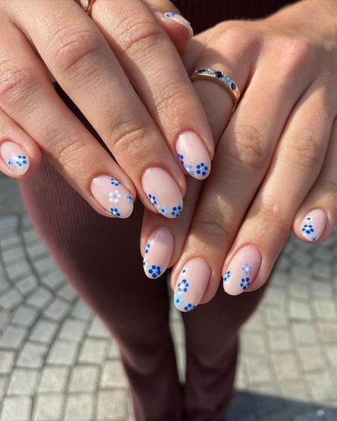 Greece Nail Inspo Almond, White With Blue Flowers Nails, Summer Nails White And Blue, White Nails Blue Flowers, Midsommar Nails, Blue And White Floral Nails, Mamma Mia Inspired Nails, Mamma Mia Nails Ideas, White Nails With Blue Flowers