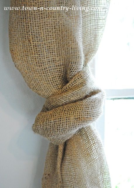 How to make a knotted burlap curtain swag Hessian Curtains Ideas, Hessian Curtains, Burlap Curtains Living Room, Basket Wall Ideas, Burlap Curtains Diy, Burlap Swag, Burlap Drapes, Bedroom Curtains With Blinds, Burlap Window Treatments