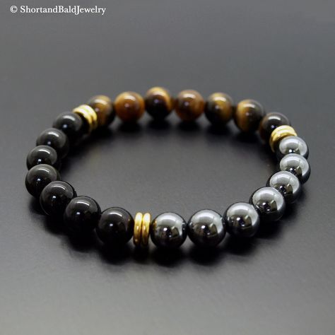 ❖ TIGER'S EYE (Yellow): AAA Quality Natural approx. 8mm gemstone ❖  ♥ Protection ♥ Inner Strength ♥ Courage ♥ Self-confidence ♥ Personal empowerment ♥ Integrity ♥ Willpower ❖ HEMATITE: Natural approx. 8mm gemstone ❖ ♥ Protection ♥ Absorb negative energy ♥ Stability ♥ Concentration ♥ Motivation ♥ Courage ♥ Stamina ♥ Vitality ♥ Confidence ♥ Optimism ♥ Balance  ❖ OBSIDIAN (Black): Natural approx. 8mm gemstone ❖ ♥ Protection ♥ Cleansing ♥ Purification ♥ Transformation ♥ Releasing negativity ♥ Spirit Mens Beaded Bracelet, Crystal Bracelets For Men, Men’s Beaded Bracelet, Mens Gemstone Bracelet, Men Bracelet Black, Black Natural Stones Beads For Healing, Men Gemstone Bracelet, Black Agate Bracelets For Healing, Black Obsidian Gemstone Beaded Bracelets